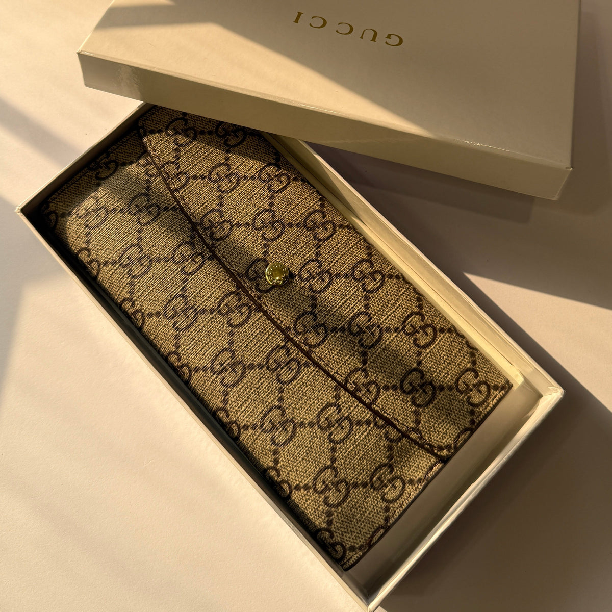Gucci GG Supreme Continental Wallet inside original Gucci branded box