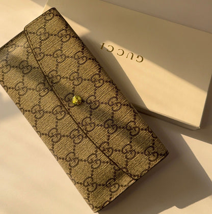 Gucci GG Supreme Continental Wallet with gold bee stud closure